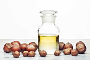 Hazelnut oil isolated on white background