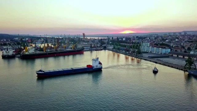 Ship leaving port of Varna on sunset