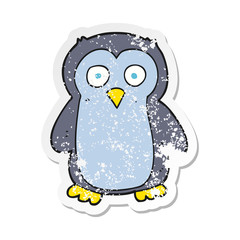 retro distressed sticker of a cartoon penguin