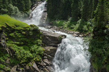 Fototapeta na wymiar Krimml waterfalls in the Alpine forest, Austria