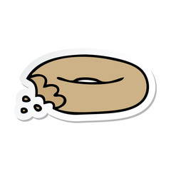 sticker of a quirky hand drawn cartoon bitten bagel