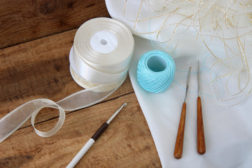 Knitting tools and accessories on the table