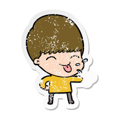 distressed sticker of a cartoon boy sticking out tongue