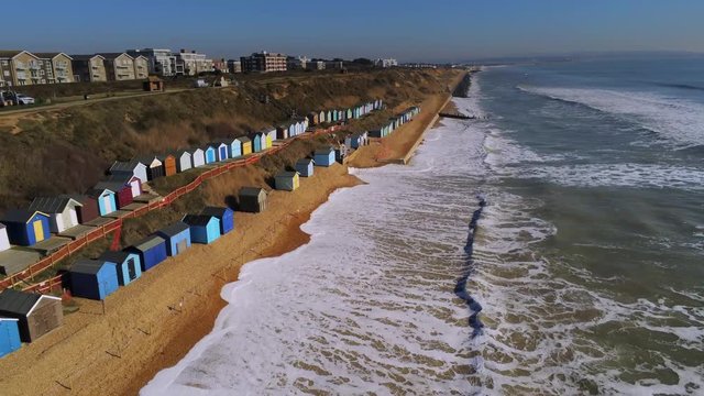 Flight over the English south coast with its colorful huts