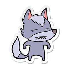 sticker of a cartoon wolf showing teeth