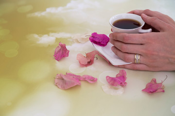 pink roses leaves on the background for happy women day ,teacher day, mother day, 8 March day, coffee concept in the cafe.