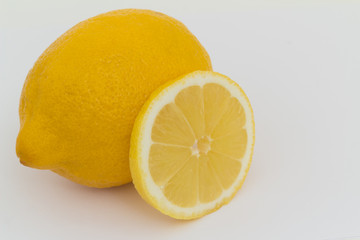 Lemon on a white background and in a cut.