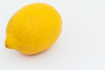 Lemon on a white background and in a cut.