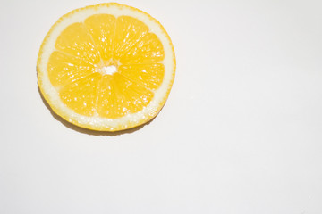 Lemon on a white background and in a cut.