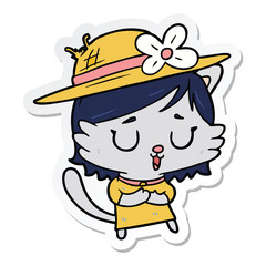 sticker of a cartoon cat wearing hat