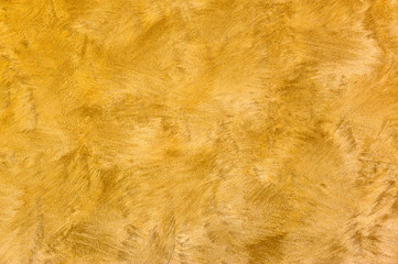 Broad brush background texture in gold and brown tones