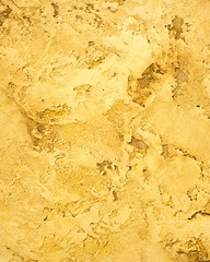 Plaster texture in golds and browns