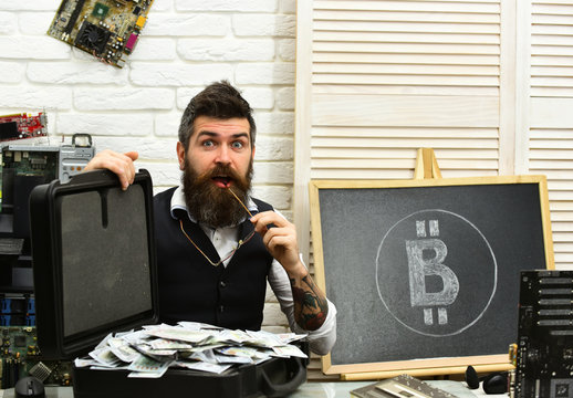 Beyond his wildest imagination. Bearded hipster with bitcoin symbol and dollars. Business man in server room. Bearded man with cash money. Bitcoin for business. From paper money to crypto currency