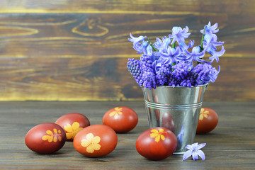 Decorated Easter eggs and spring flowers
