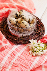 Easter egg and spring flowers on a wooden background . - Image
