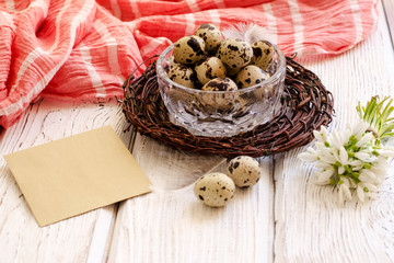 Easter egg and spring flowers on a wooden background . - Image