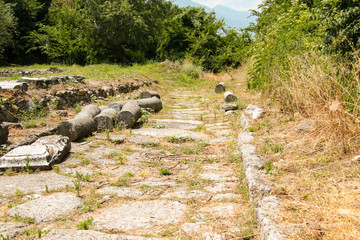 Ancient Greece city Dion. Remains of the ancient main road. Archaeological park of sacred city of Macedon.