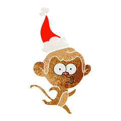 retro cartoon of a surprised monkey wearing santa hat