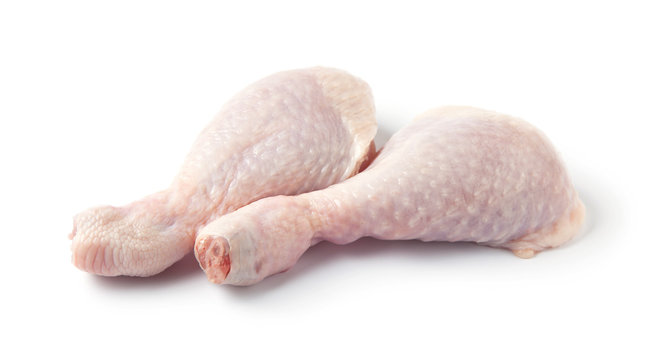 Raw chicken legs, thight, isolated on white background.