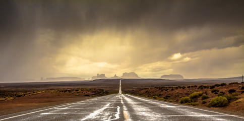 Picturesque view of dramatic overcast sky over asphalt countryside road in Grand Canyon