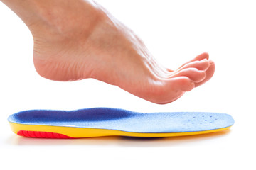 orthopedic insole and female leg