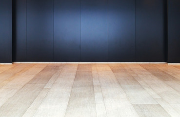 wooden floor and black wall interior background