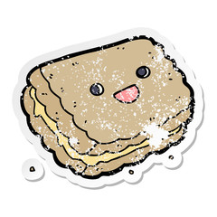 distressed sticker of a cartoon biscuit
