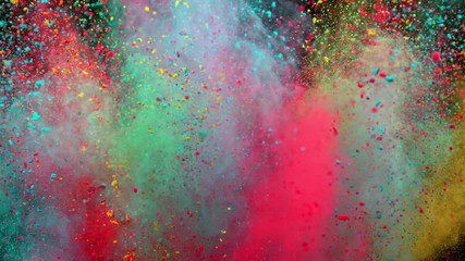 Super slowmotion shot of color powder explosion isolated on black background.