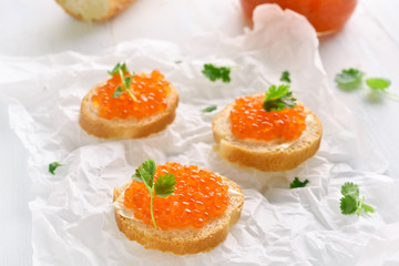 Sandwiches with red caviar