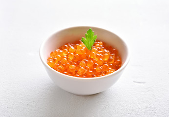 Fototapeta na wymiar Red caviar in bowl