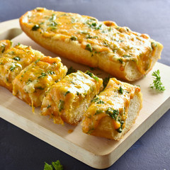 Cheese and garlic bread with greens