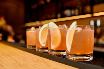 cocktails with lemon on the bar