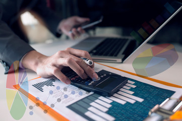 Obraz na płótnie Canvas businessman analyzing financial data on digital tablet