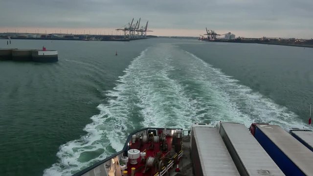 A ferry leaves the harbor of Dunkirk port towards England