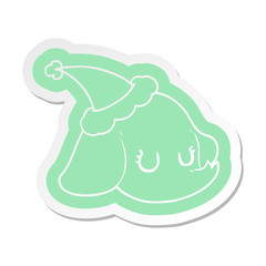 cartoon  sticker of a elephant face wearing santa hat