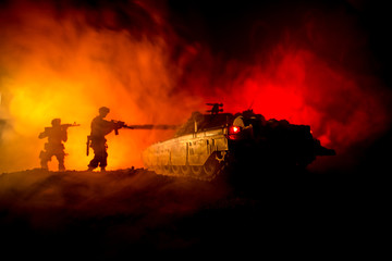 War Concept. Military silhouettes fighting scene on war fog sky background, World War German Tanks...