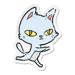 distressed sticker of a cartoon cat staring
