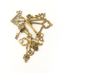 Decorative keys of different sizes, stylized antique on a white background. left