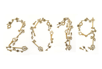 Decorative keys of different sizes, stylized antique on a white background. Form the centerpiece. 2019