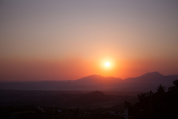 Great sunset on Kos. Clear sky and a few mountains in the haze