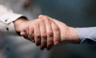 close up.confident handshake of business people