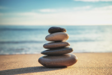 Stones balance on the beach. Zen meditation. Yoga.