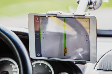 Driver in the car controls the navigator
