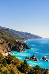 Fototapeta premium Blue Water along Coastline, Coastal Mountains