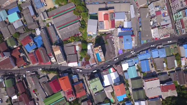 Drone fly down above the  road junction and streets at Patong,Phuket island,Thailand,zoom shot
