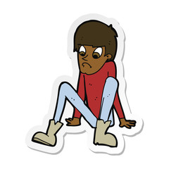 sticker of a cartoon boy sitting on floor