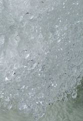 Fragment of the waterfall in winter.
