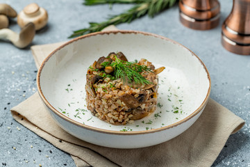Fried buckwheat porridge with onions and mushrooms