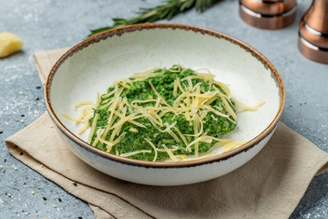 Spinach with cream and baked Parmesan cheese