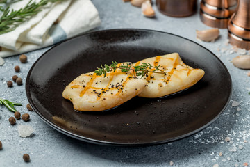 Roasted squid on board
